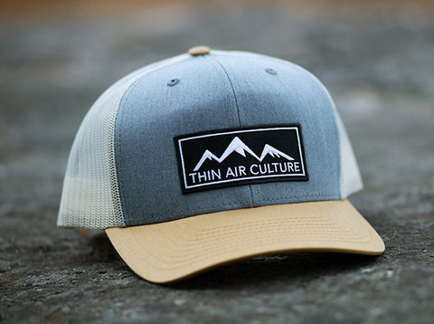 Hat- Cotton twill trucker with pre-curved visor